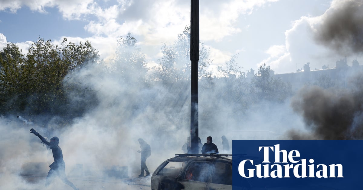 Police clash with protesters as tens of thousands take to streets across France | France