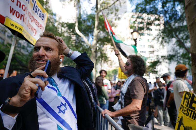 FILE - Rabbi Shmuley Boteach confronts pro-Palestinian demonstrators outside United Nations headquarters, Friday, Sept. 26, 2025, in New York. (AP Photo/Stefan Jeremiah, File)