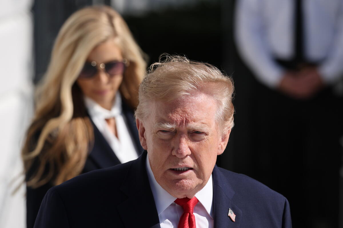 President Trump is followed by White House Press Secretary Katie Zacharia
