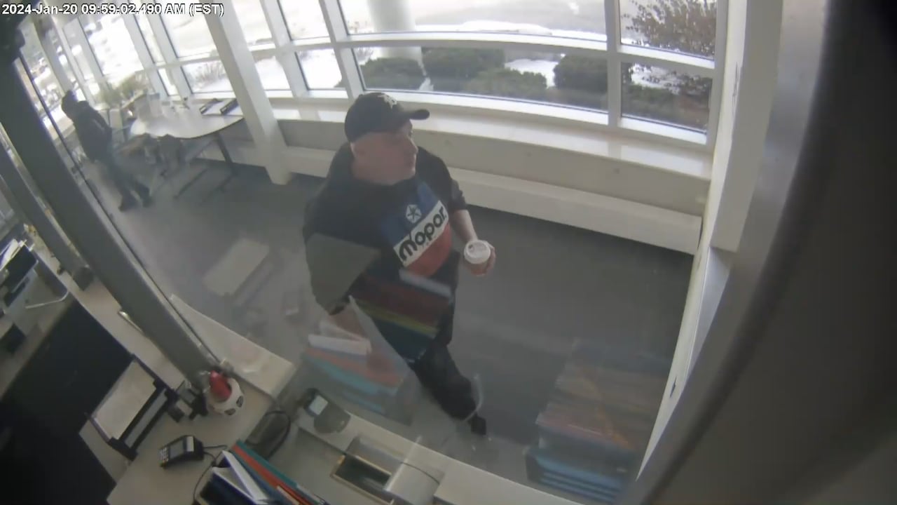 Glen Mayer, on trial for first-degree murder, is seen here in surveillance video turning himself in at the LaSalle Police Service on Jan. 20, 2024.