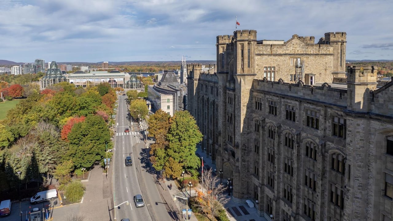 Aerial view of the CRA headquarters, a multi-storey building in the Tudor Gothic style.