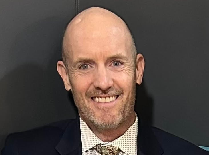 A man in a suit.