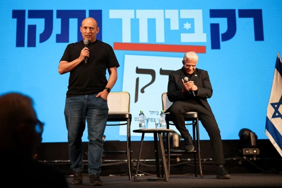 Former prime ministers Naftali Bennett and Yair Lapid attend an event for their B'Yachad party, ahead of Israel’s national election, in Haifa, Israel, October 21, 2026.
