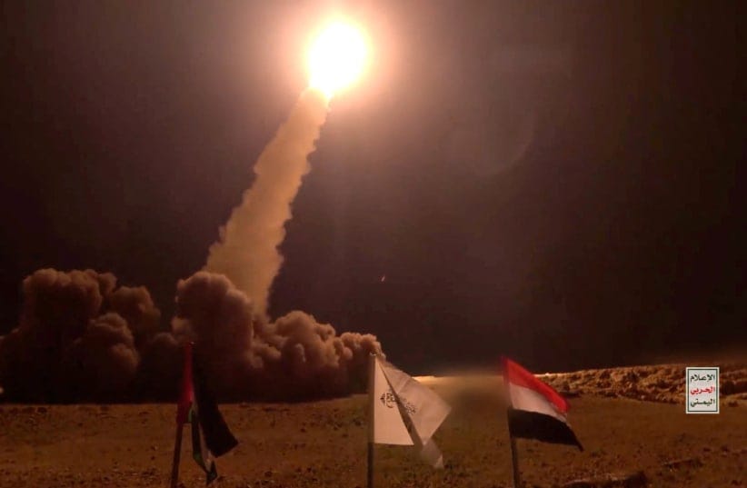  Footage released by Houthi Military Media says to show a launch of missile, which the Houthis say they fired at Israel, at an unknown location in this screen grab obtained from a handout video released on December 19, 2024. 