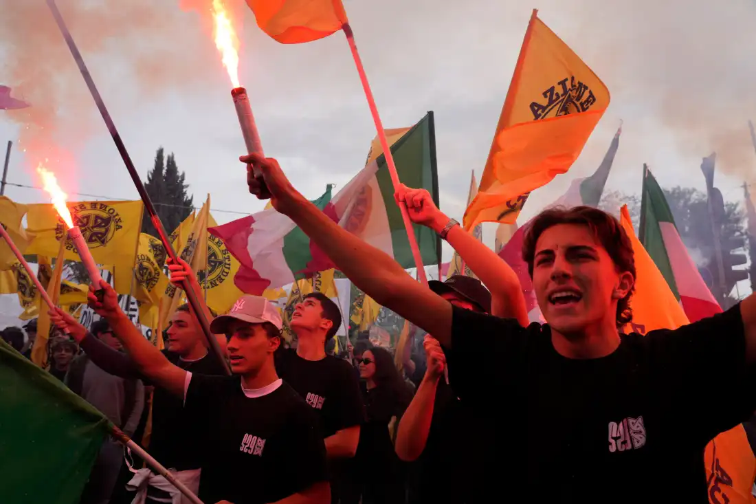 Members of right-wing student groups march through the streets of Rome, Saturday, Oct. 24, 2026, during a demonstration called "Unlock Everything," organized in opposition to recent left-wing student protests and one of several demonstrations held by groups across the political spectrum.