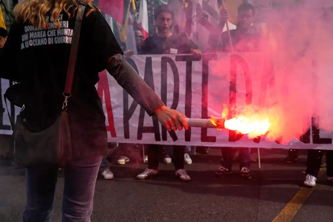 Members of right-wing student groups march through the streets of Rome, Saturday, Oct. 24, 2026, during a demonstration called "Unlock Everything," organized in opposition to recent left-wing student protests and one of several demonstrations held by groups across the political spectrum.
