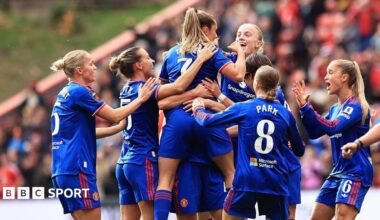 Leah Williamson celebrates as Arsenal beat Tottenham in the WSL