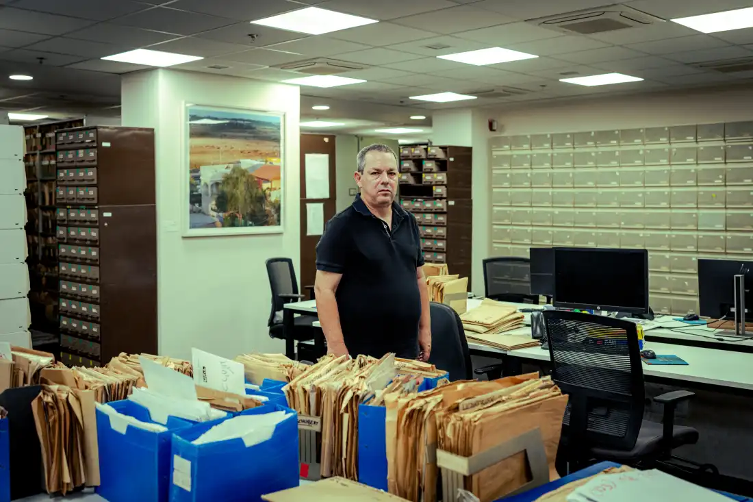 Amos Harel, military and defense analyst for the Israeli daily Haaretz, is pictured inside the newspaper's archival library at the Haaretz offices in Tel Aviv on Sept. 24, 2026. Harel has extensively reported on Israeli defense strategy, military operations, and Middle East security for decades. (Erik Marmor for NPR)