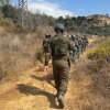 Israeli security forces, including military and police, declared a closed military zone around a olive grove and escorted activists and rabbis away from the area before detaining them near the Israeli settlement of Beitar Illit in the occupied West Bank.