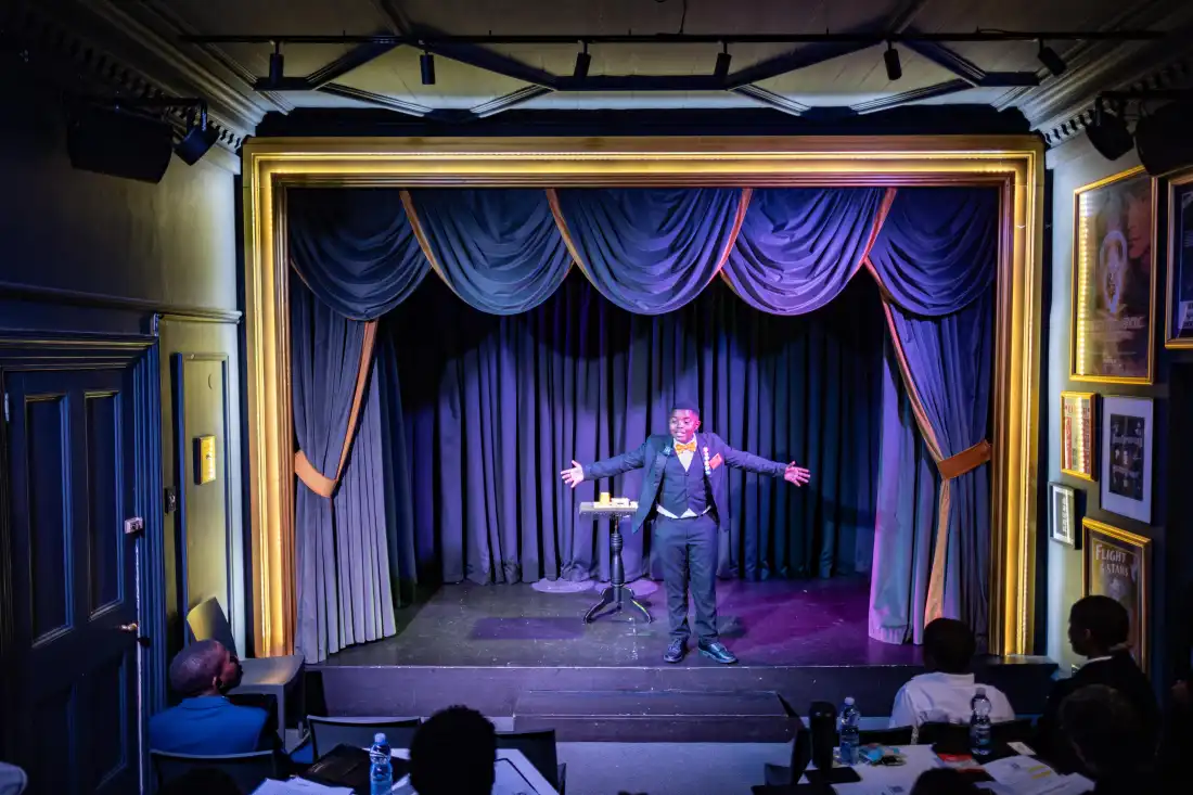 Lubelo Mthenjana begins his perforance during the annual junior magic contest at the College of Magic in Cape Town, South Africa.
