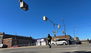 Pedestrian dies after being struck by vehicle at crosswalk