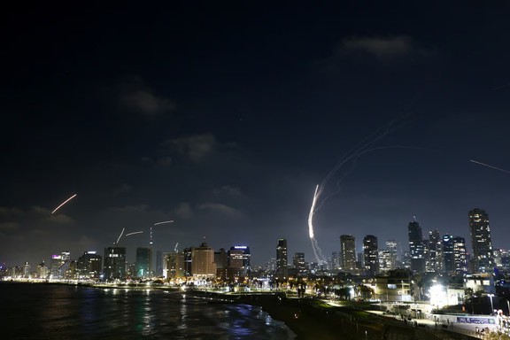 Missiles launched from Iran are intercepted as seen from Tel Aviv, Israel, June 13, 2025.
