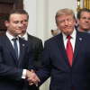 President Donald Trump shakes hands with Commodity Futures Trading Commission (CFTC) Chairman Michael Selig during a meeting with technology leaders in the Roosevelt Room of the White House, Wednesday, Aug. 19, 2026, in Washington. (AP Photo/Jacquelyn Martin)