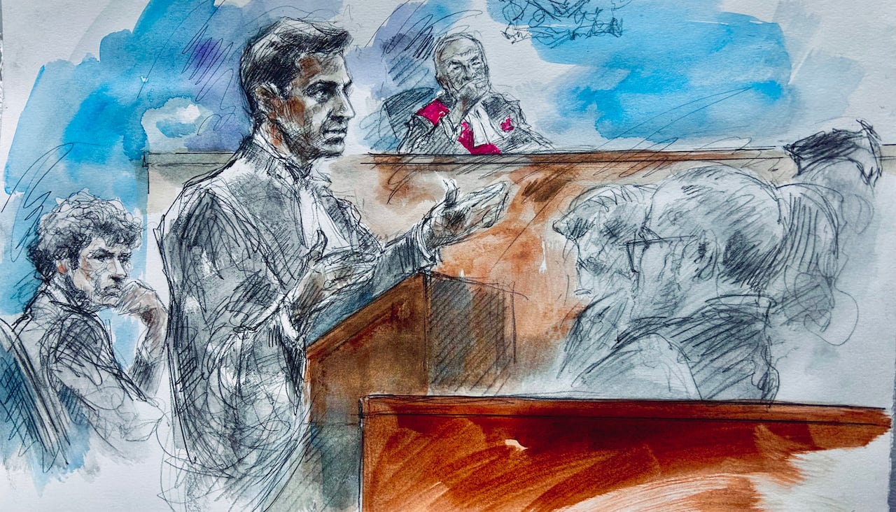 Court sketch of a male lawyer addressing the jury in court.