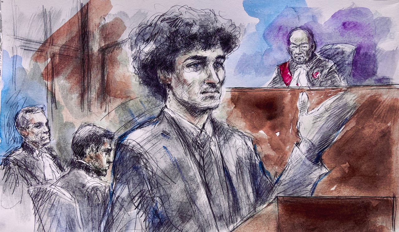 Court sketch of a man addressing the jury at a podium.