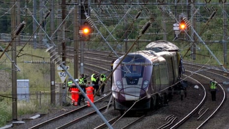 Emergency services attend to injured after two trains collide near Bedford – video