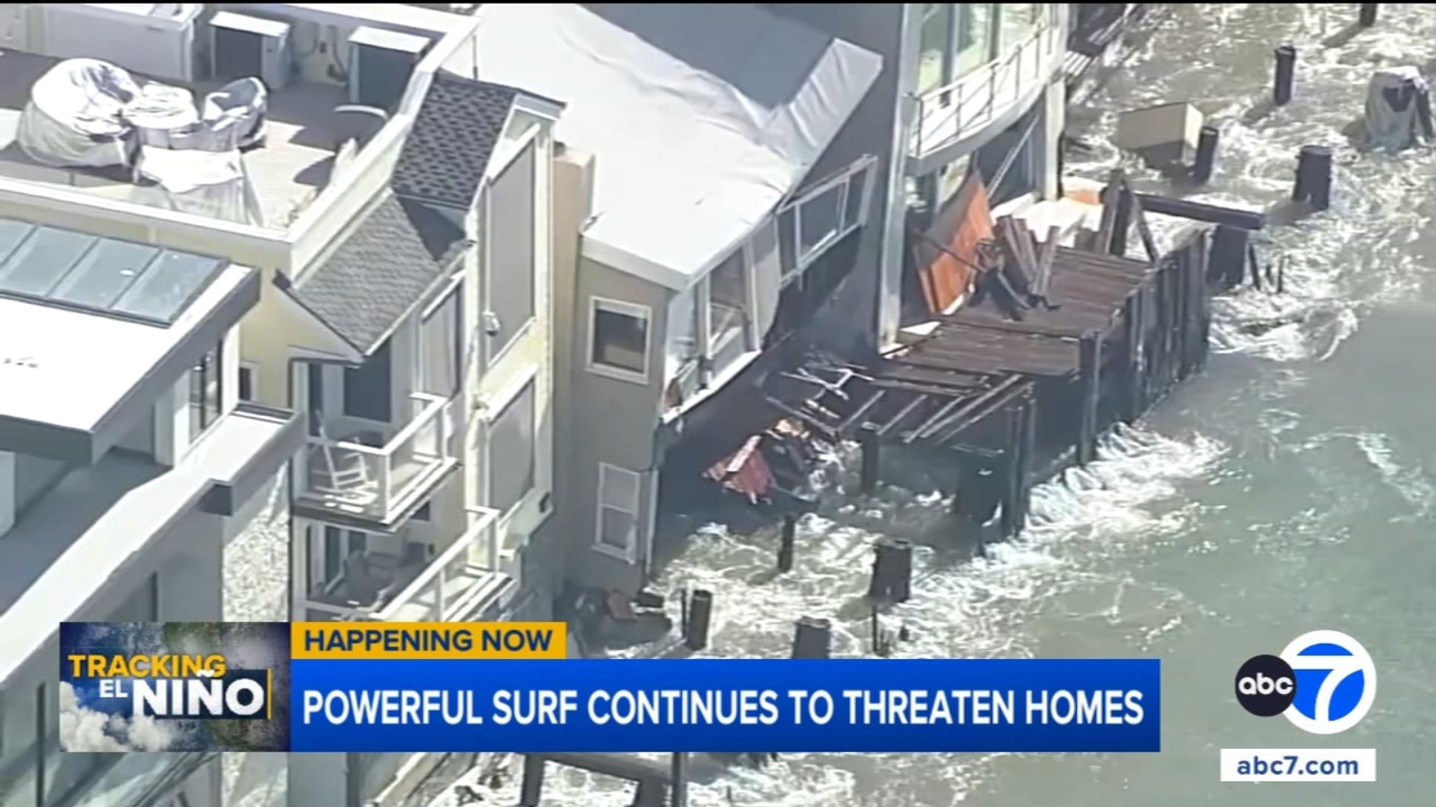 Aerial view shows extent of destruction to homes along Long Beach coastline