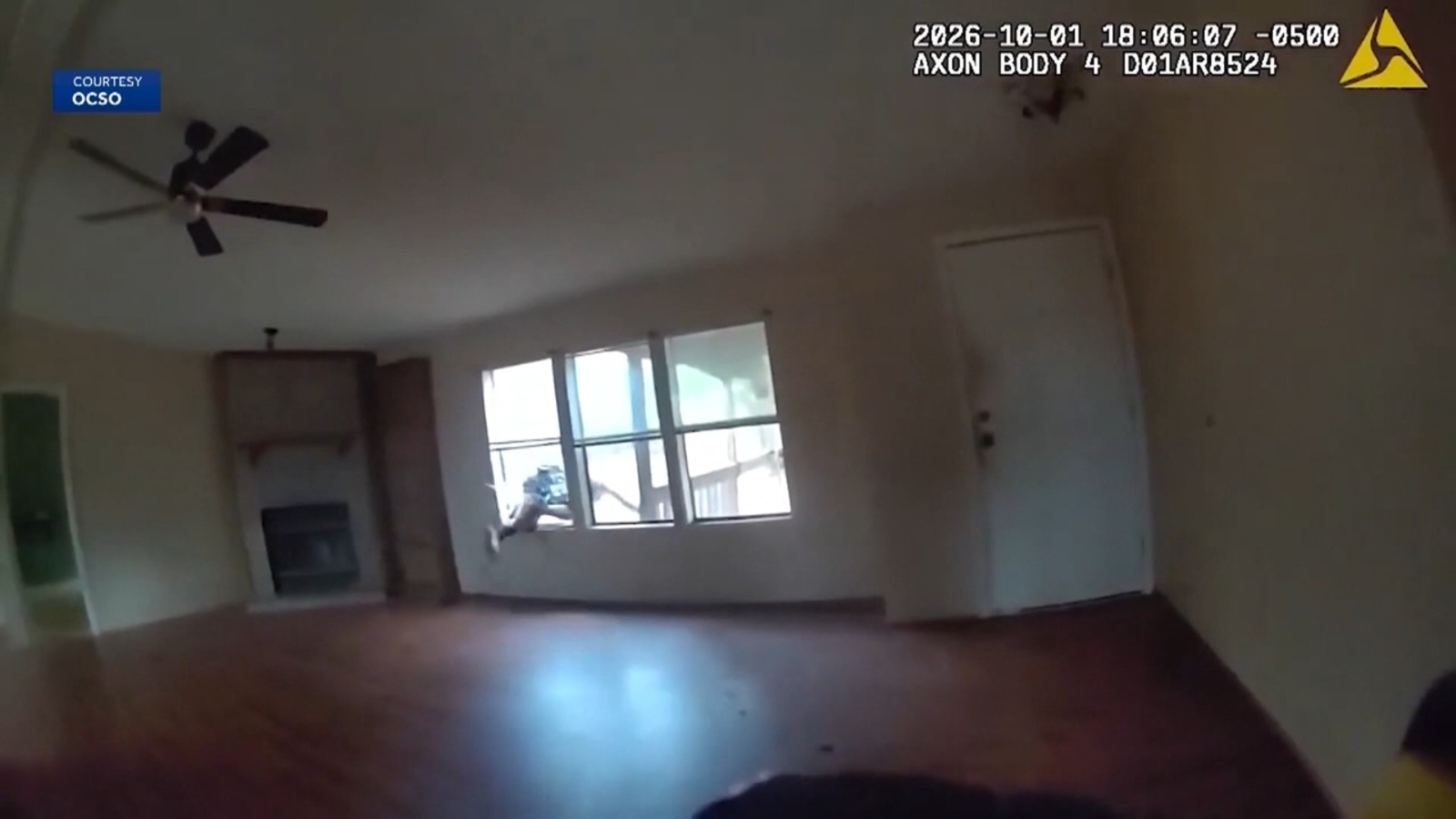 Body camera video shows suspect smashing through window to evade deputy in Oklahoma County