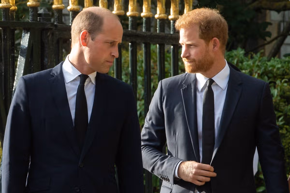 Prince William, the new Prince of Wales, and Prince Harry, the Duke of Sussex, arrive to view floral tributes to Queen Elizabeth II laid outside Cambridge Gate at Windsor Castle on 10th September 2022 in Windsor, United Kingdom. Queen Elizabeth II, the UK's longest-serving monarch, died at Balmoral aged 96 on 8th September 2022 after a reign lasting 70 years. (photo by Mark Kerrison/In Pictures via Getty Images)