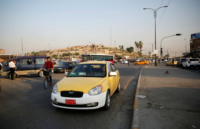 A man drives a Careem taxi car in Mosul, Iraq September 26, 2019. REUTERS/Abdullah Rashid