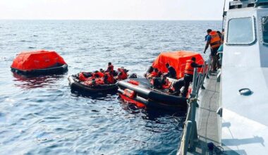 Sri Lanka Navy personnel assist Iranian sailors during a rescue operation in Indian Ocean