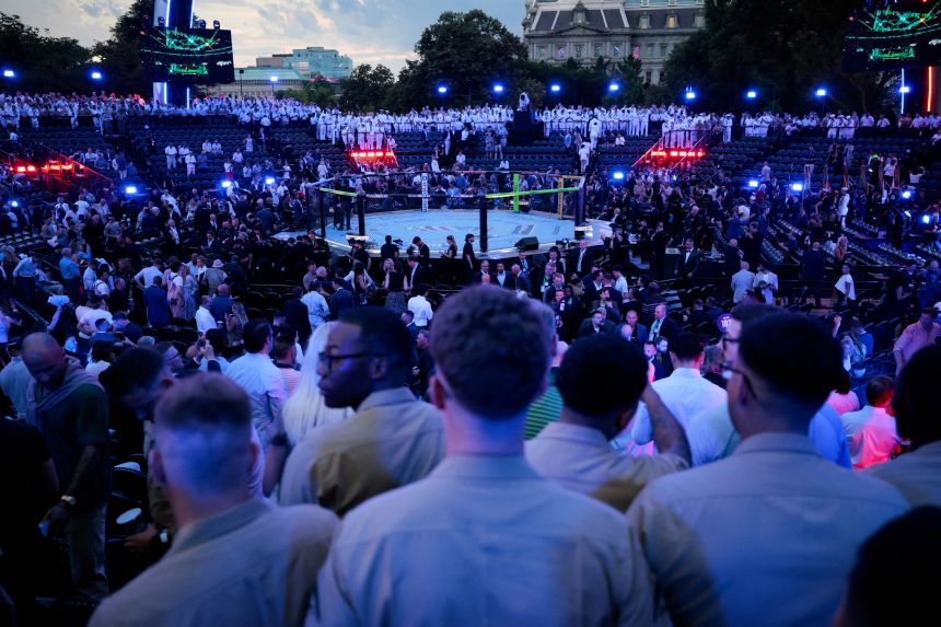 Attendees wait ahead of UFC Freedom 250 at the White House in Washington, DC, on June 14, 2026.