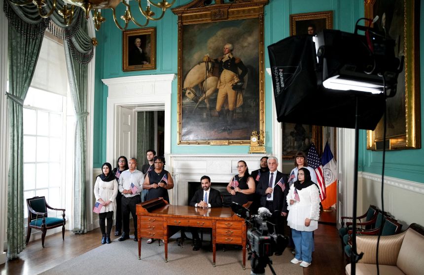 New York City Mayor Zohran Mamdani delivers a speech from George Washington's desk to mark the 250th anniversary of the United States of America, surrounded by recently naturalized citizens at City Hall in New York, NY, on July 3.