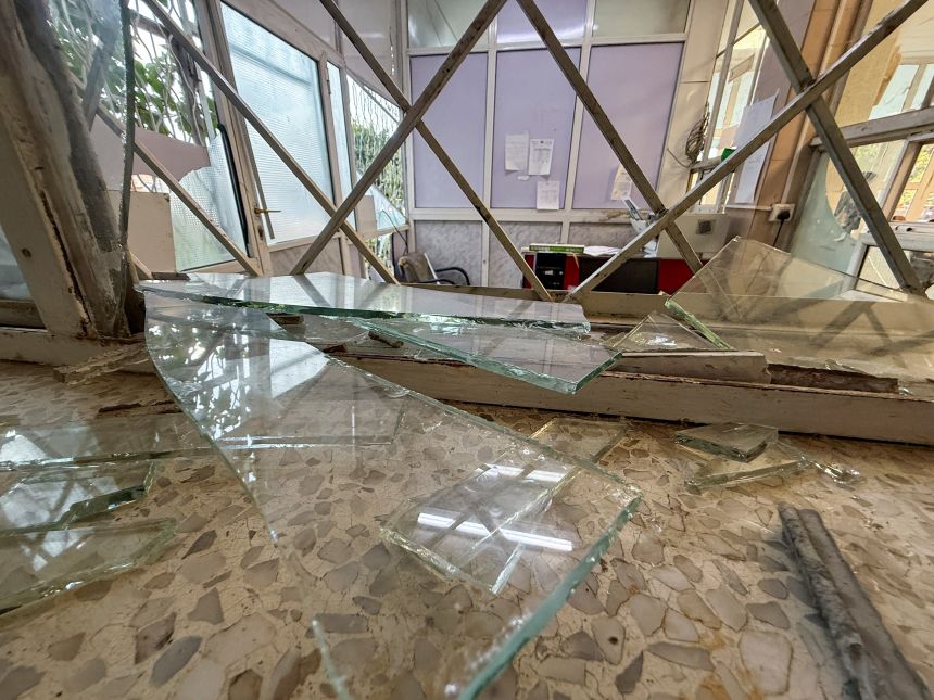 Pieces of shattered glass are scattered in a hospital following an airstrike on a nearby building in Sanaa, Yemen, October 3, 2026.