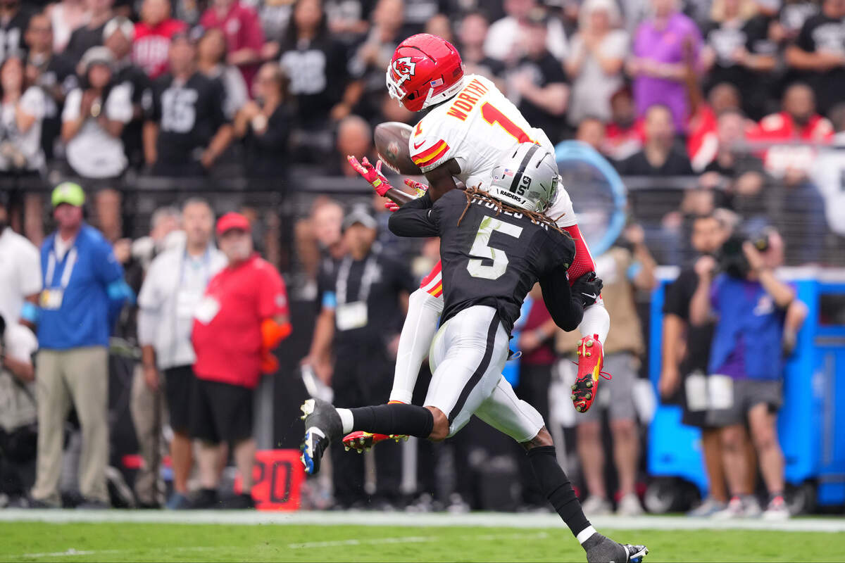 Kansas City Chiefs wide receiver Xavier Worthy (1) catches a pass against Las Vegas Raiders cornerback Eric Stokes (5) during a Week 4 NFL game at Allegiant Stadium in Paradise, Nevada on Sunday, Oct. 4, 2026.