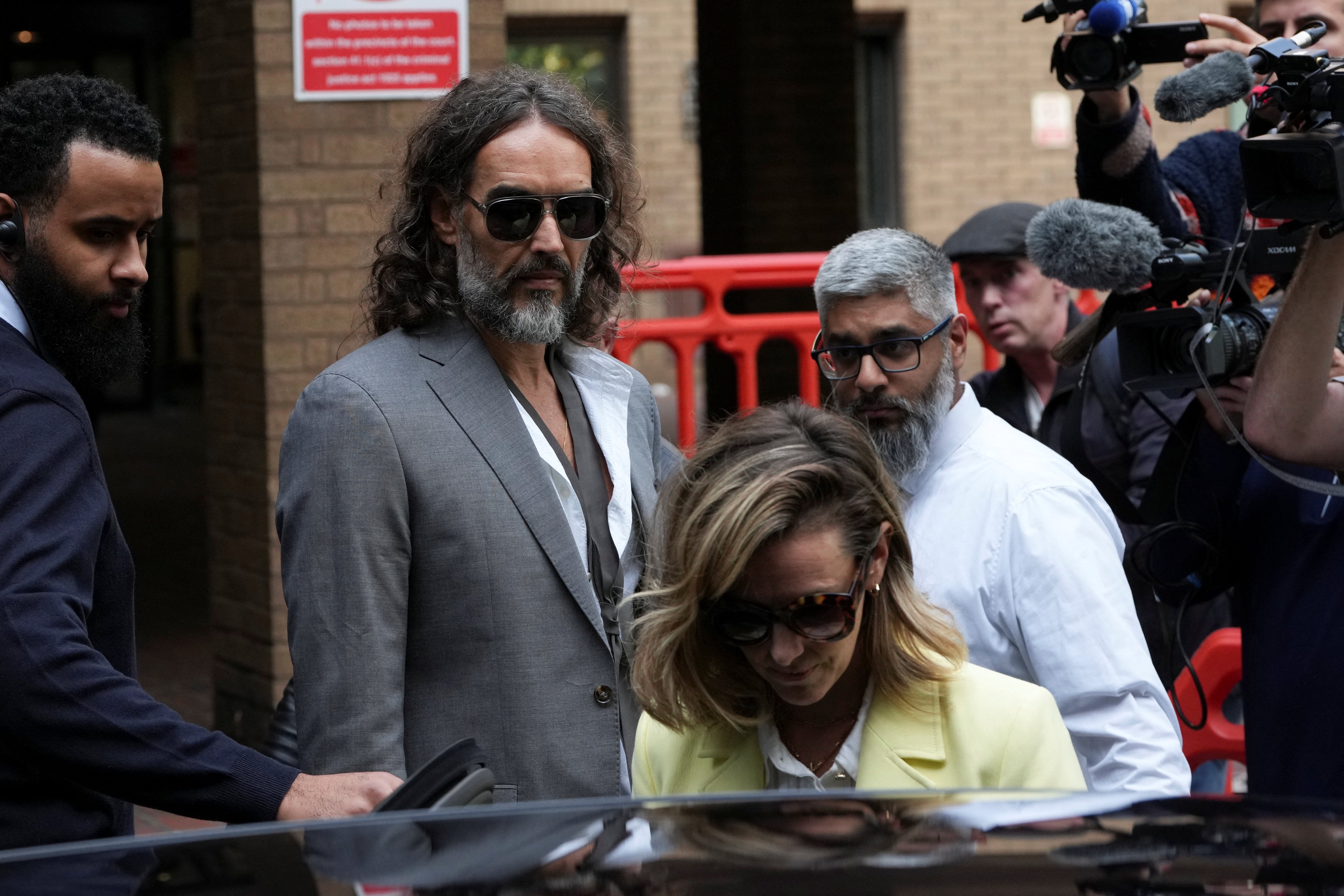 She also joined him for a pretrial hearing last week