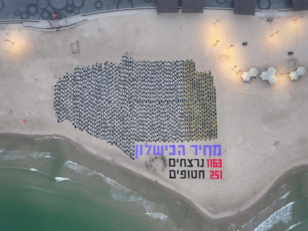 A drone view shows an installation depicting bodies, on the third anniversary of the deadly October 7, 2023, Hamas-led att...