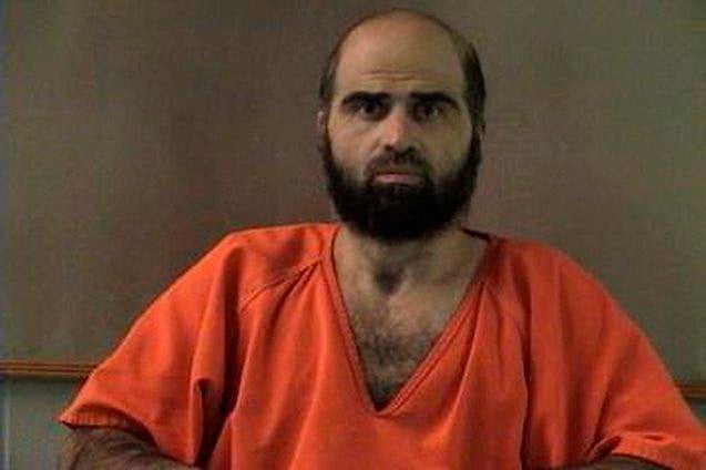 Nidal Hasan, charged with killing 13 people and wounding 32 in a November 2009 shooting spree at Fort Hood, is pictured in an undated handout photo obtained by Reuters on June 29, 2012.