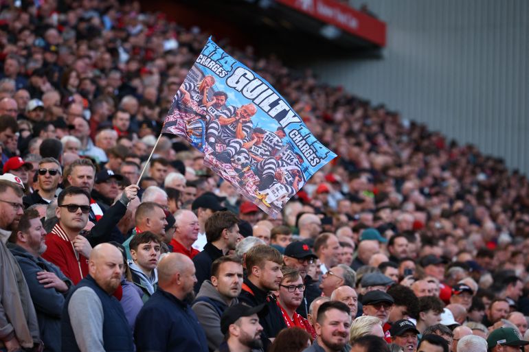 Soccer Football - Premier League - Liverpool v Manchester City - Anfield, Liverpool, Britain - October 11, 2026 Liverpool fans with a banner related to the Manchester City's Premier League charges inside the stadium before the match REUTERS/Phil Noble EDITORIAL USE ONLY. NO USE WITH UNAUTHORIZED AUDIO, VIDEO, DATA, FIXTURE LISTS, CLUB/LEAGUE LOGOS OR 'LIVE' SERVICES. ONLINE IN-MATCH USE LIMITED TO 120 IMAGES, NO VIDEO EMULATION. NO USE IN BETTING, GAMES OR SINGLE CLUB/LEAGUE/PLAYER PUBLICATIONS. PLEASE CONTACT YOUR ACCOUNT REPRESENTATIVE FOR FURTHER DETAILS..