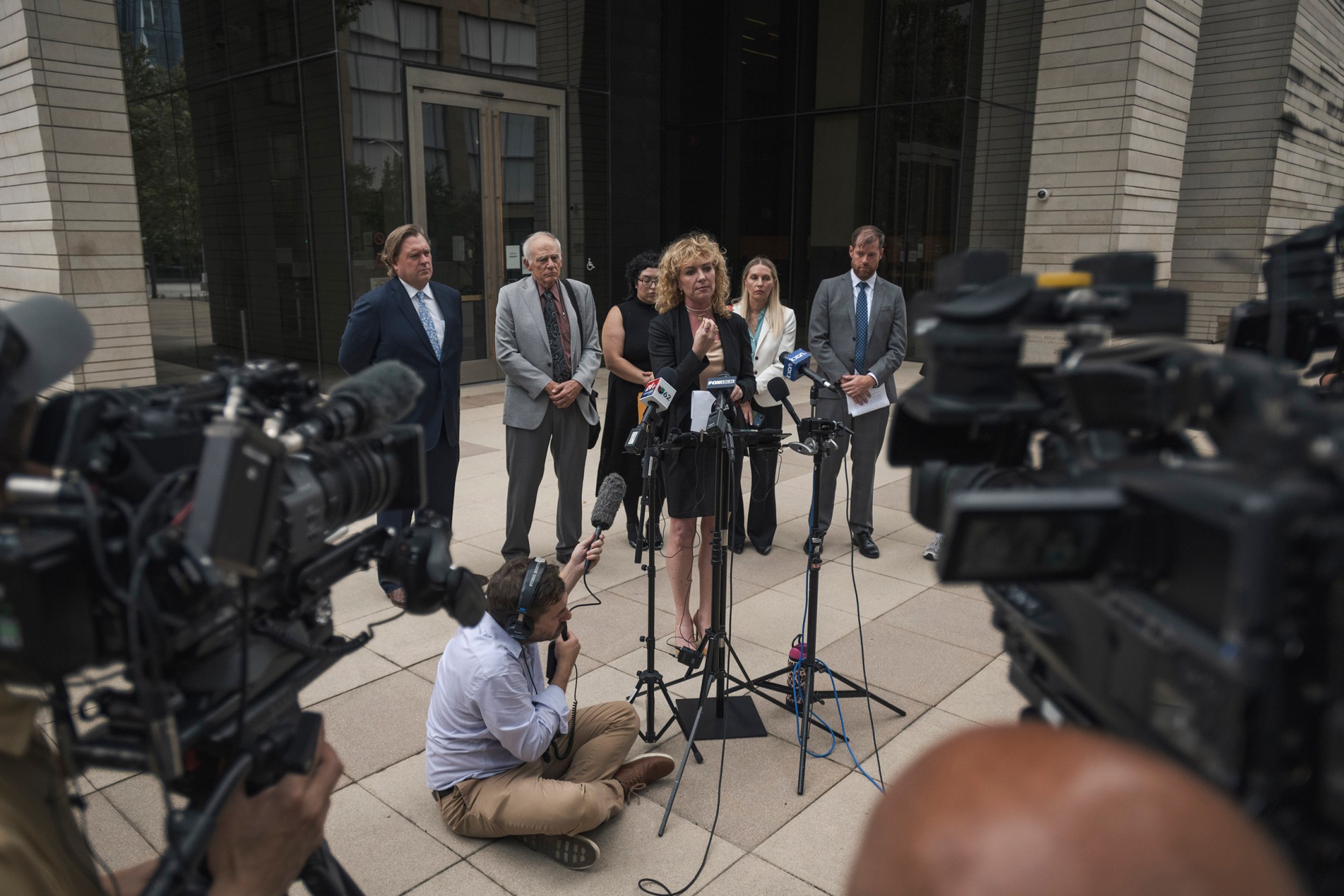 Kate Lincoln-Goldfinch, an immigration attorney representing Wilber Rafael Garcés Pérez, who was shot by federal immigration agents on September 20, holds a press conference following his federal bail hearing at the United States Federal Courthouse in Austin on Wednesday, Sept. 30, 2026.