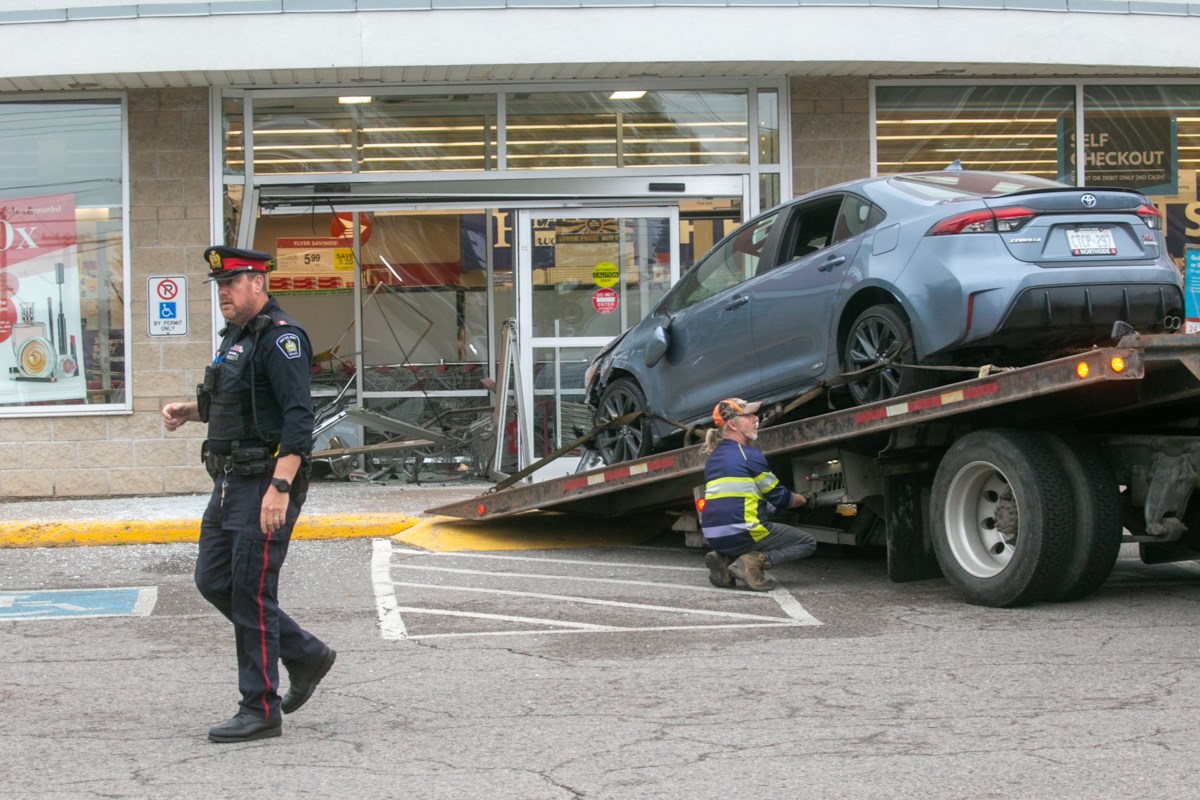 Car crashes into Shoppers Drug Mart on Second Line