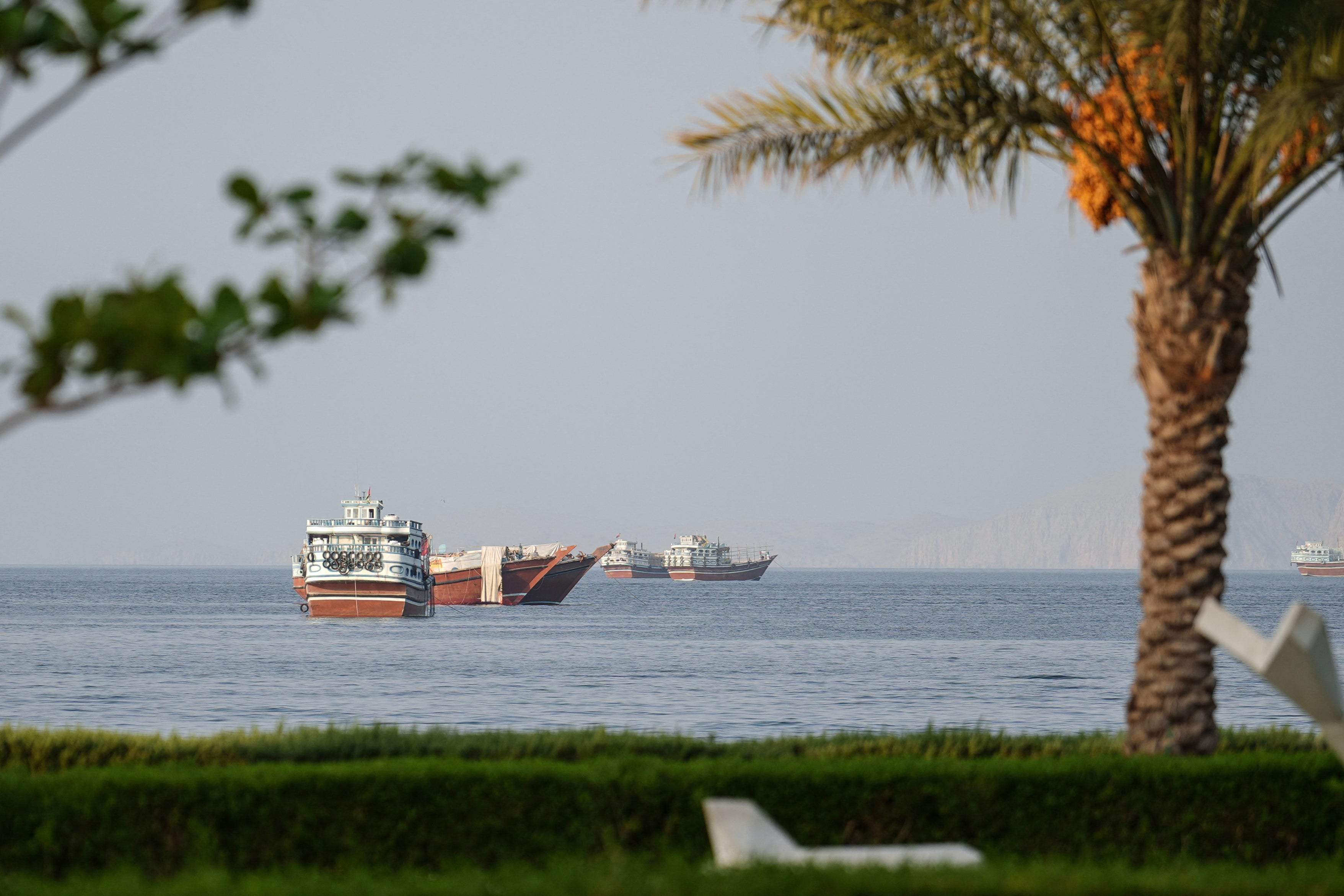Ships are anchored off the coast of Khasab in Oman's Musandam Governorate, near the Strait of Hormuz, on October 2, 2026.
