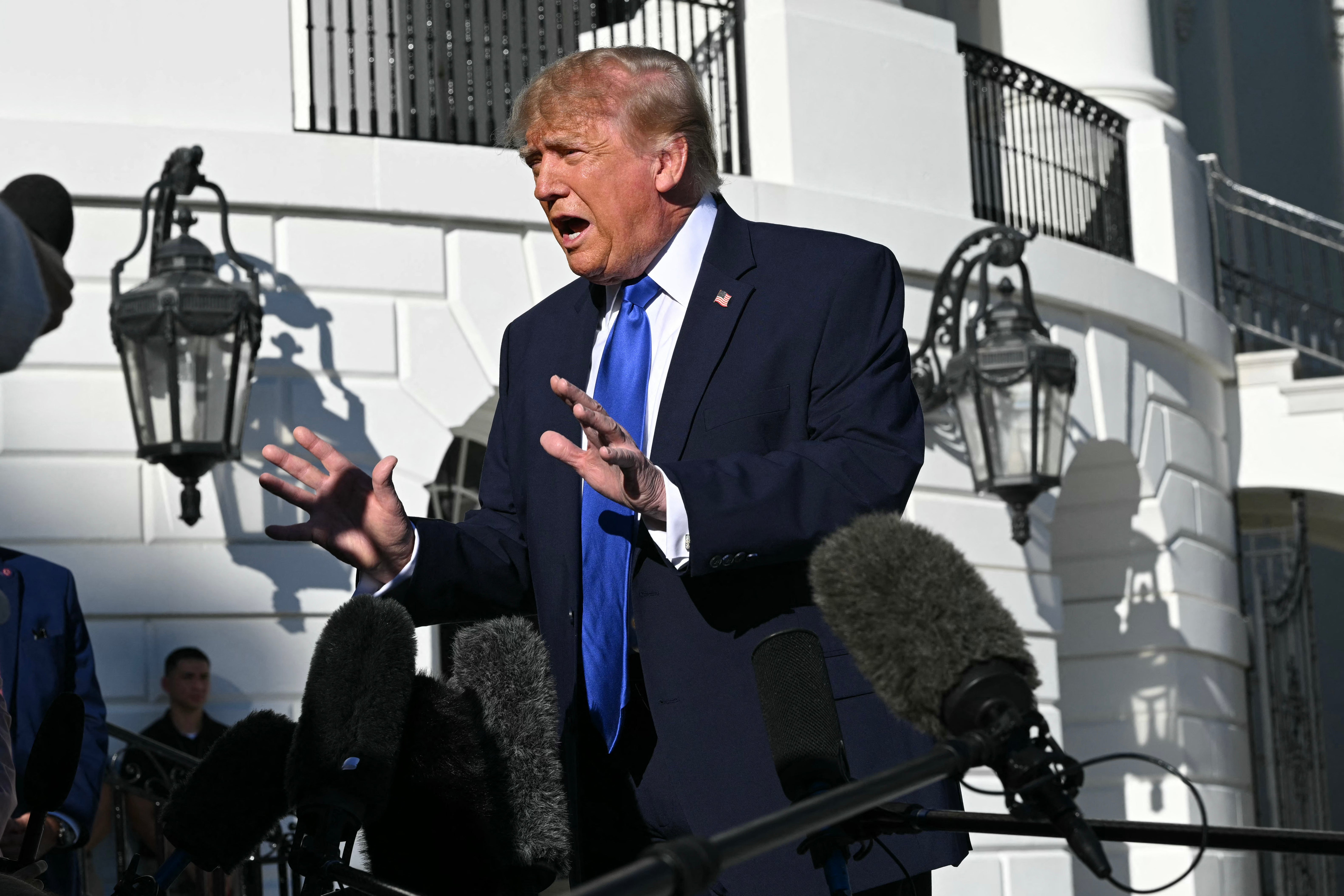 Trump defends Ramaswamy’s ad when questioned by reporters at the White House Thursday before jetting out for a campaign rally in Iowa