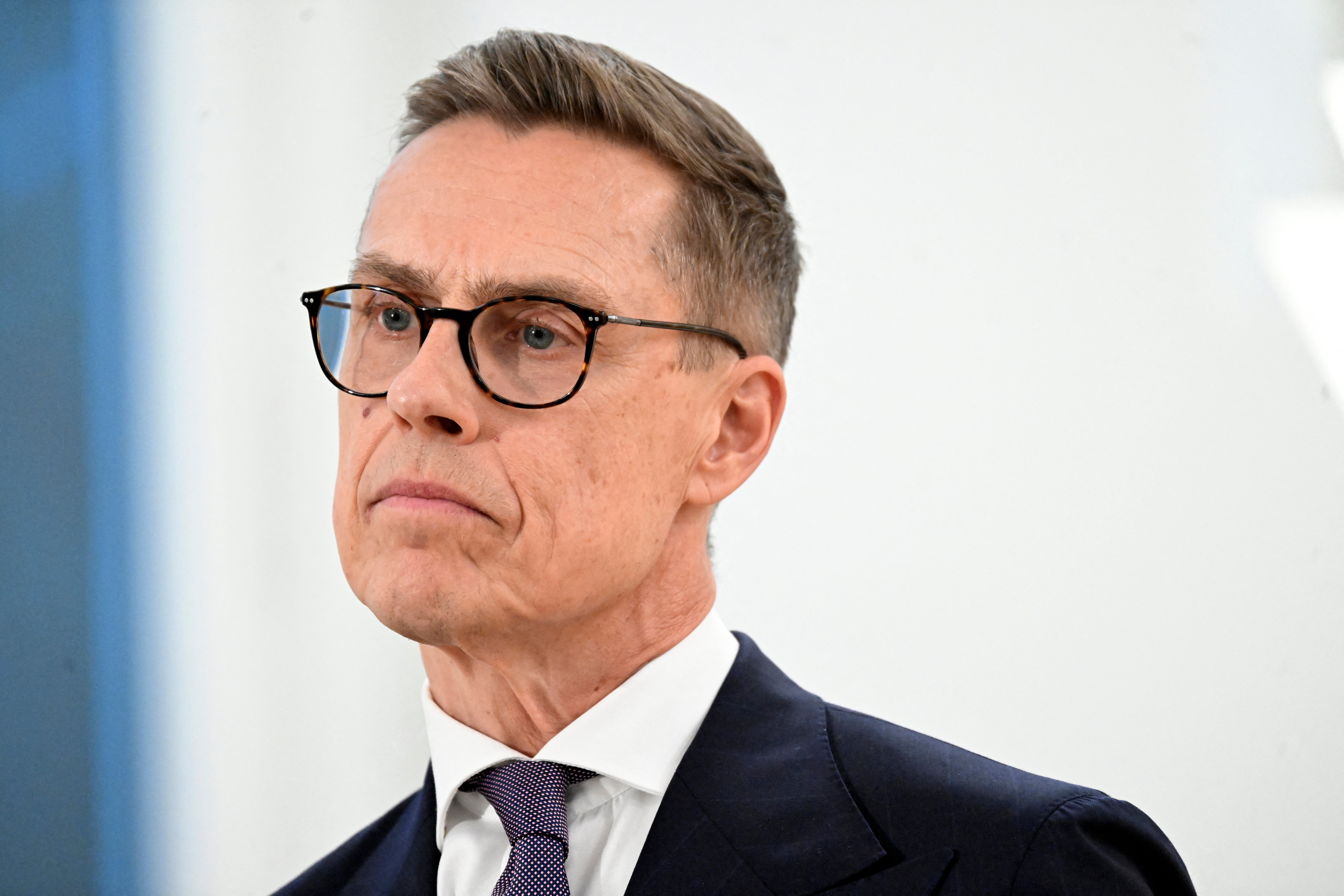 Finland's President Alexander Stubb addresses journalists at the president's official residence