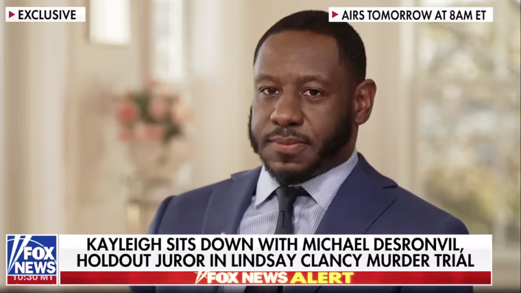 Image: Michael Desronvil sat during an interview.