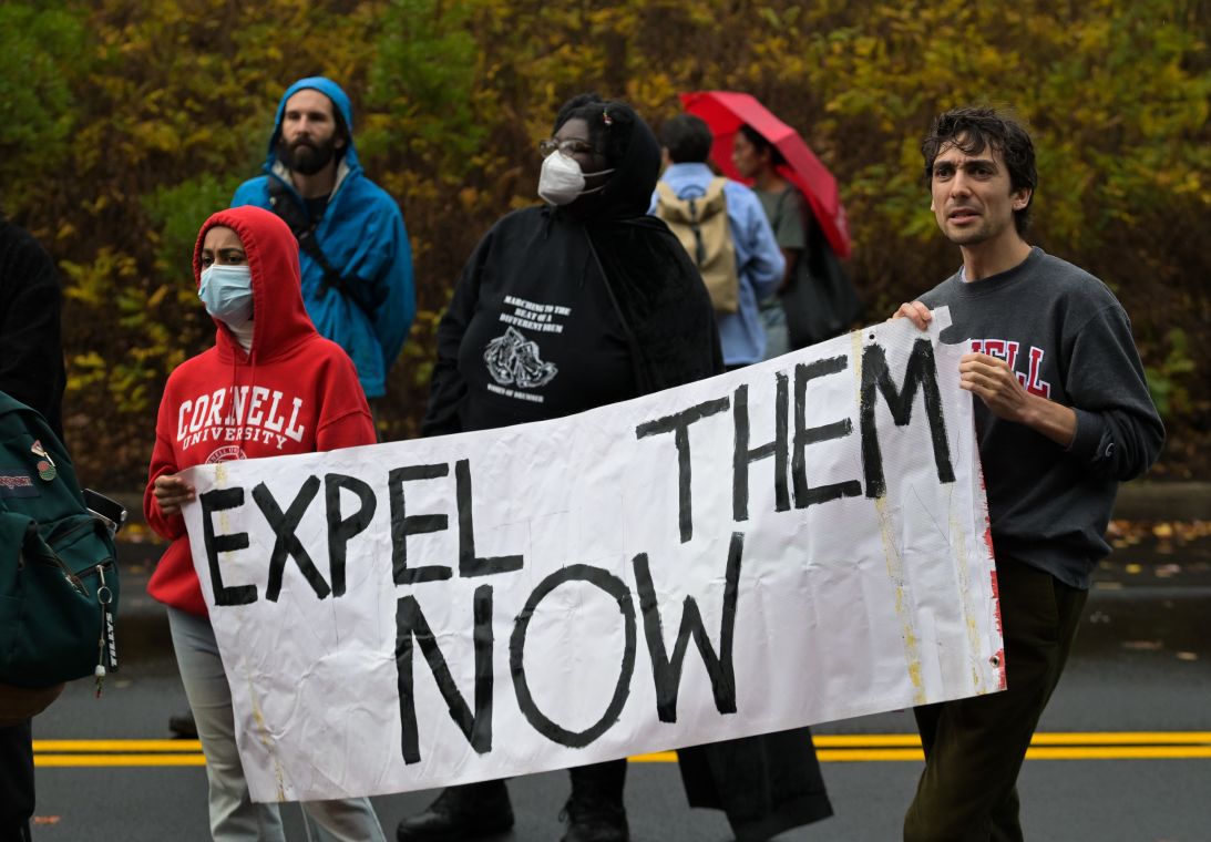Protesters chanted for Cornell's President to resign and called for an end to frats on Friday.