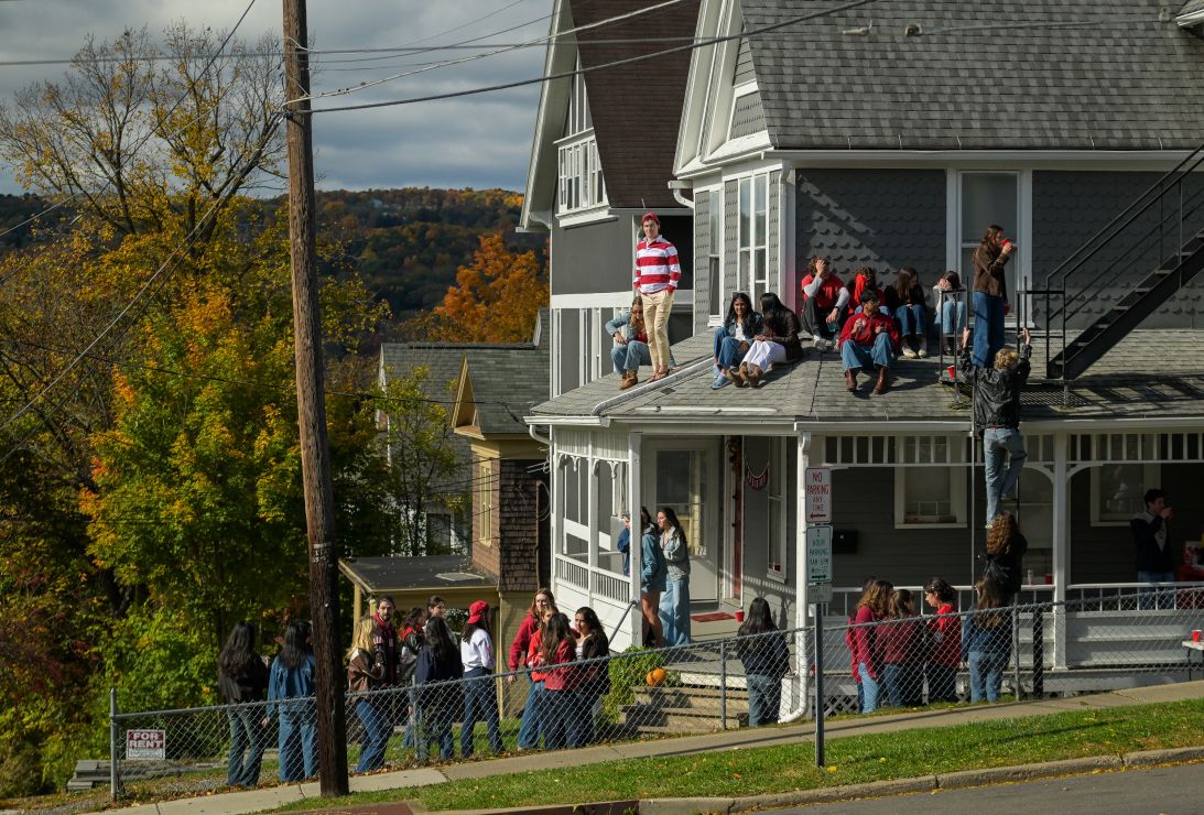 Cornell students party in Collegetown on Saturday, shortly before the police shut down the celebrations.