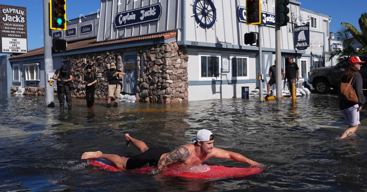 King tides inundate streets and flood homes along both U.S. coasts