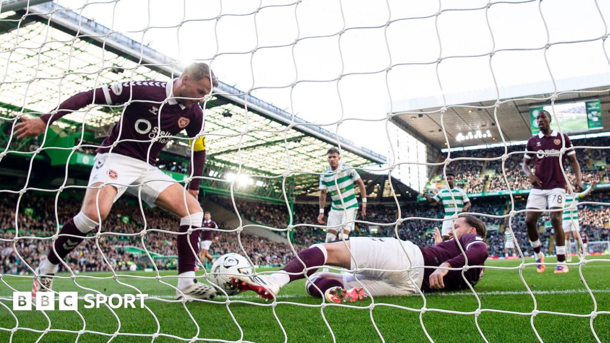 Hearts players try to prevent Celtic's fifth goal