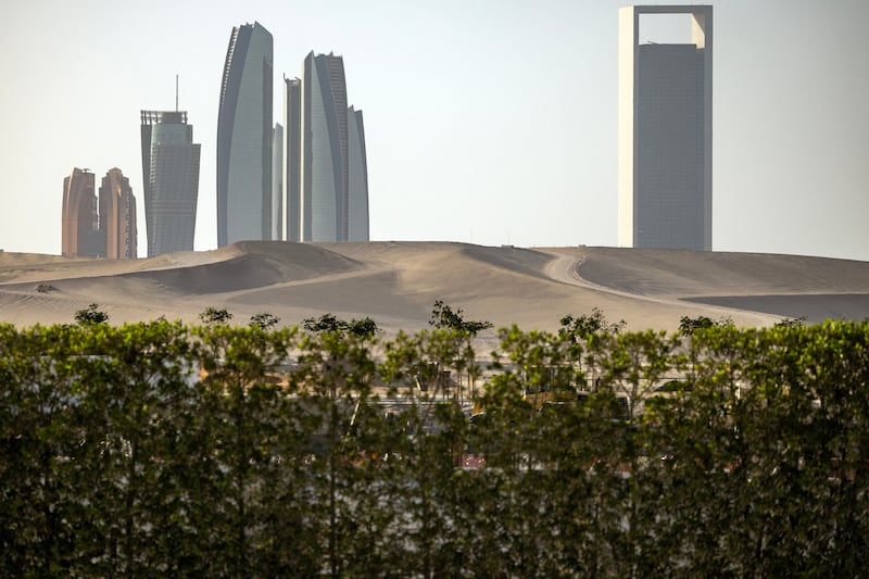 TOPSHOT - This picture shows a view of the Abu Dhabi skyline on May 14, 2025. (Photo by FADEL SENNA / AFP) (Photo by FADEL SENNA/AFP via Getty Images)