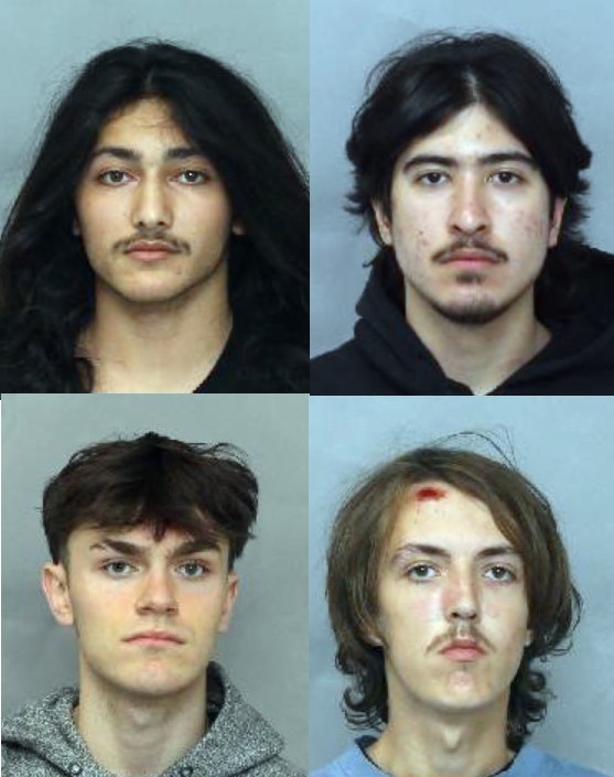 4 men arrested after allegedly breaking into downtown Toronto building to take social media photos