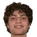 Smiling young man with curly brown hair