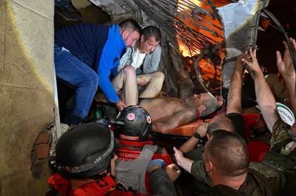 Russian Missile Strike Destroys Kharkiv Apartment Entrance, Killing 3 and Injuring 15
