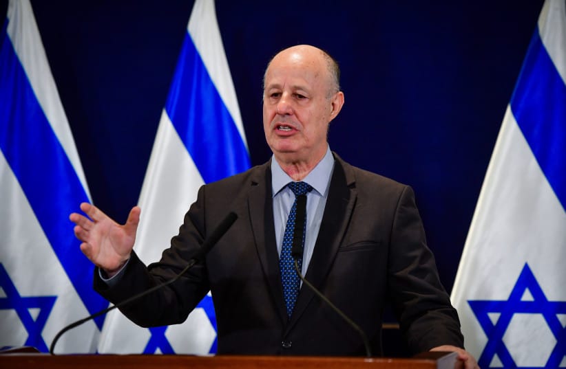 National Security Advisor Tzachi Hanegbi speaks during a statement to the media at HaKirya base in Tel Aviv on October 14, 2023