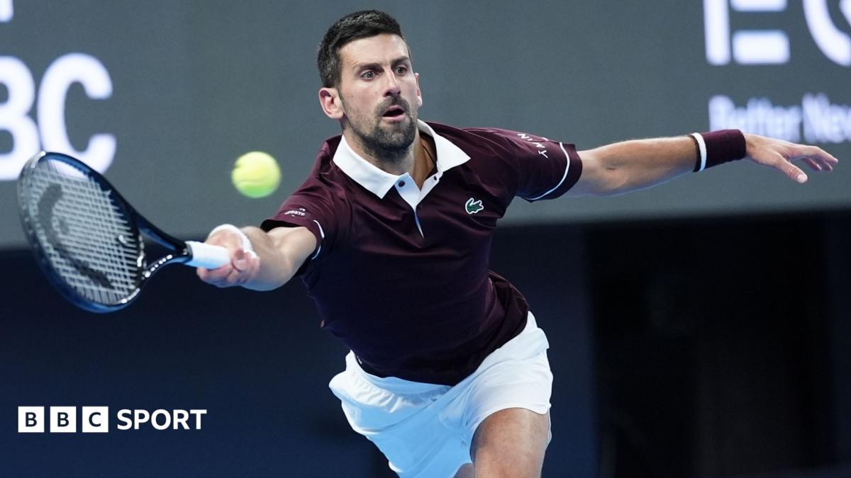 Novak Djokovic stretches to hit a forehand stroke during his quarter-final victory over Alexander Zverev