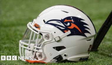 US airman dies as daredevil descent goes wrong before Texas college football game - BBC